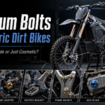Featured image showing an electric dirt bike with titanium bolts installed on the wheel hub, brake adapter, footpeg bracket, frame mounts, axle block, and suspension linkage for lightweight performance upgrades.
